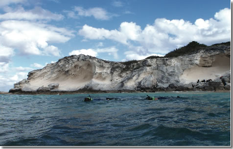 COVER PHOTO: View of Grotto Bay, southwest coast of San Salvador Island, Bahamas.  Rocks of the upper Pleistocene Grotto Beach Formation crop out along this coast.  Students conduct a field exercise here to characterize the different units of this formation and interpret their depositional history, as part of the Smith College course on carbonate systems and coral reefs of the Bahamas.  Photo credit: Deedie Steele, Northampton, Massachusetts. 