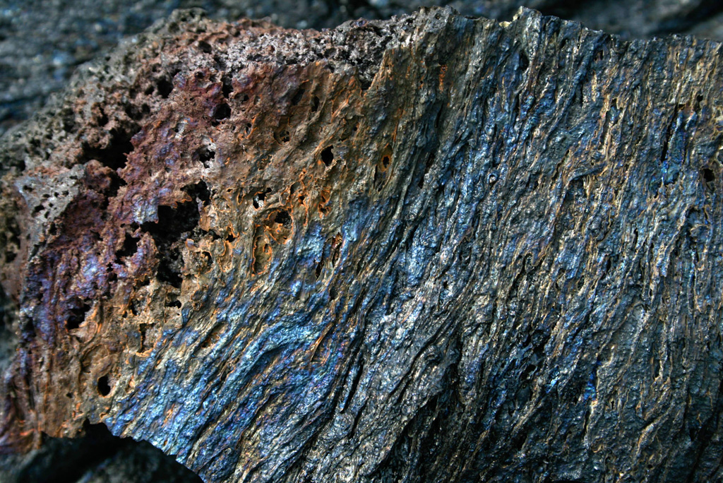 Colorful glass surface of basalt flow