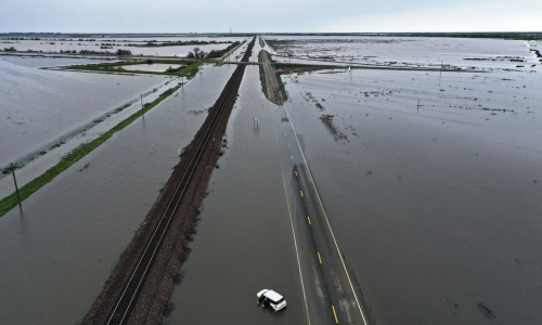 Photograph of flooded highway in California, U.S. after heavy winter storms in 2023. The state’s flood control system was overwhelmed by the intense precipitation, and many low-lying and flat areas were inundated (Bittle, 2023).